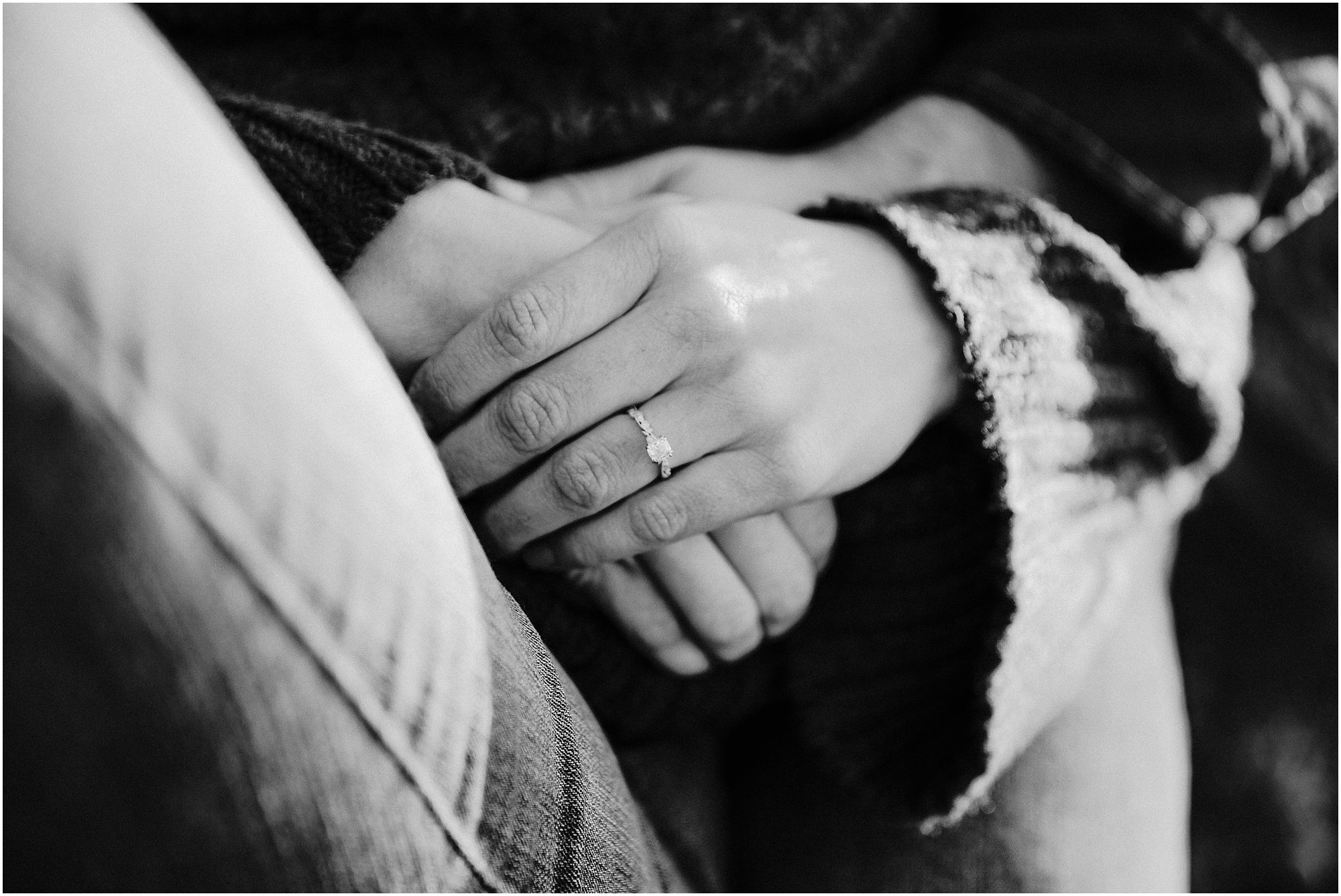 Detail shot of fiancé's engagement ring 