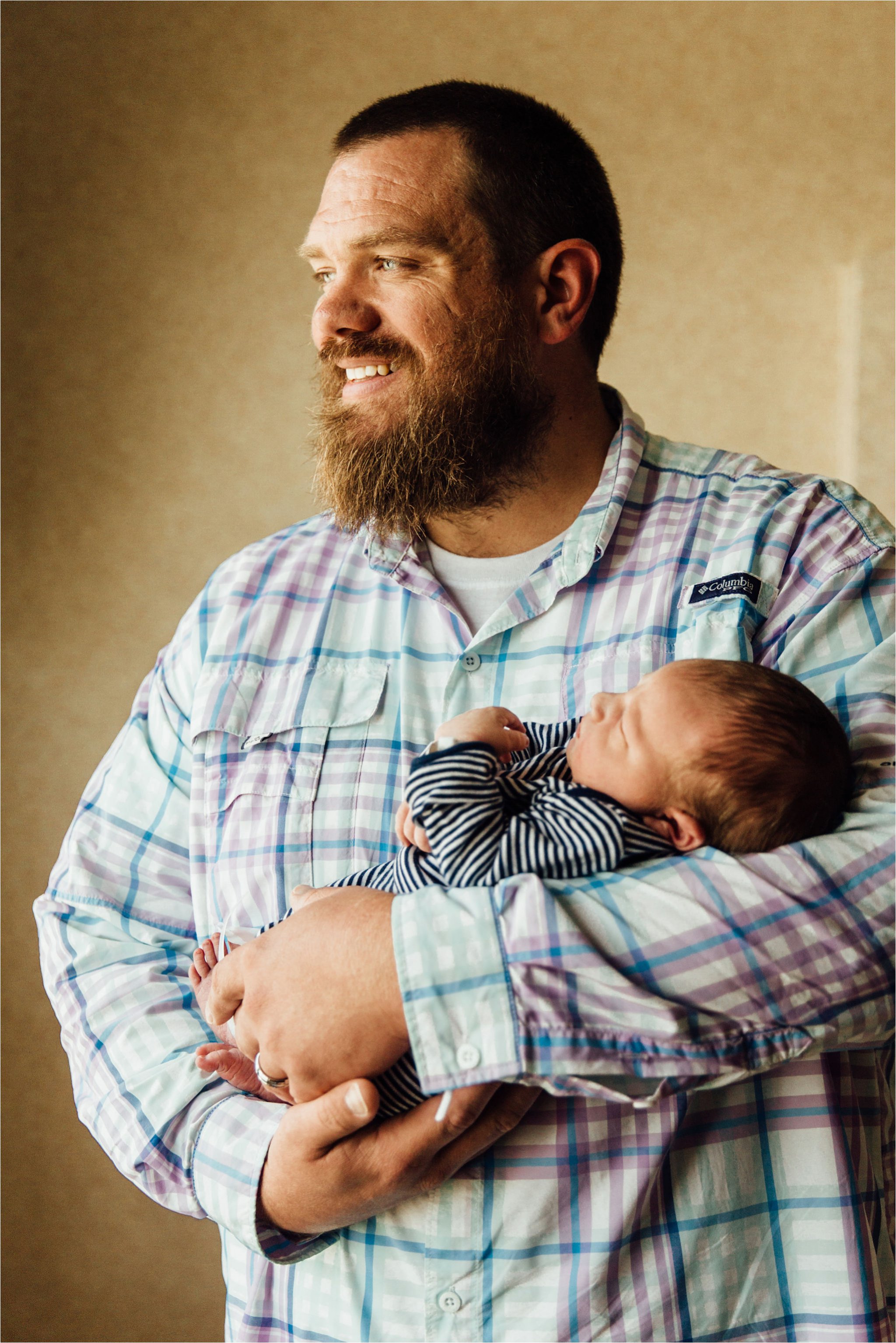 Dad and new son during their Memphis, Tennessee photo shoot.
