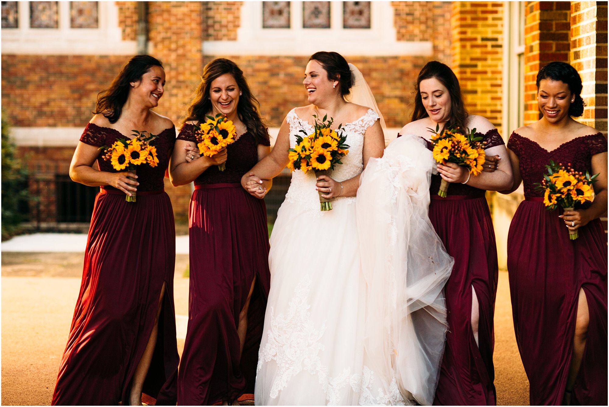 Bride walking and laughing together with bridesmaids in Memphis Tennessee