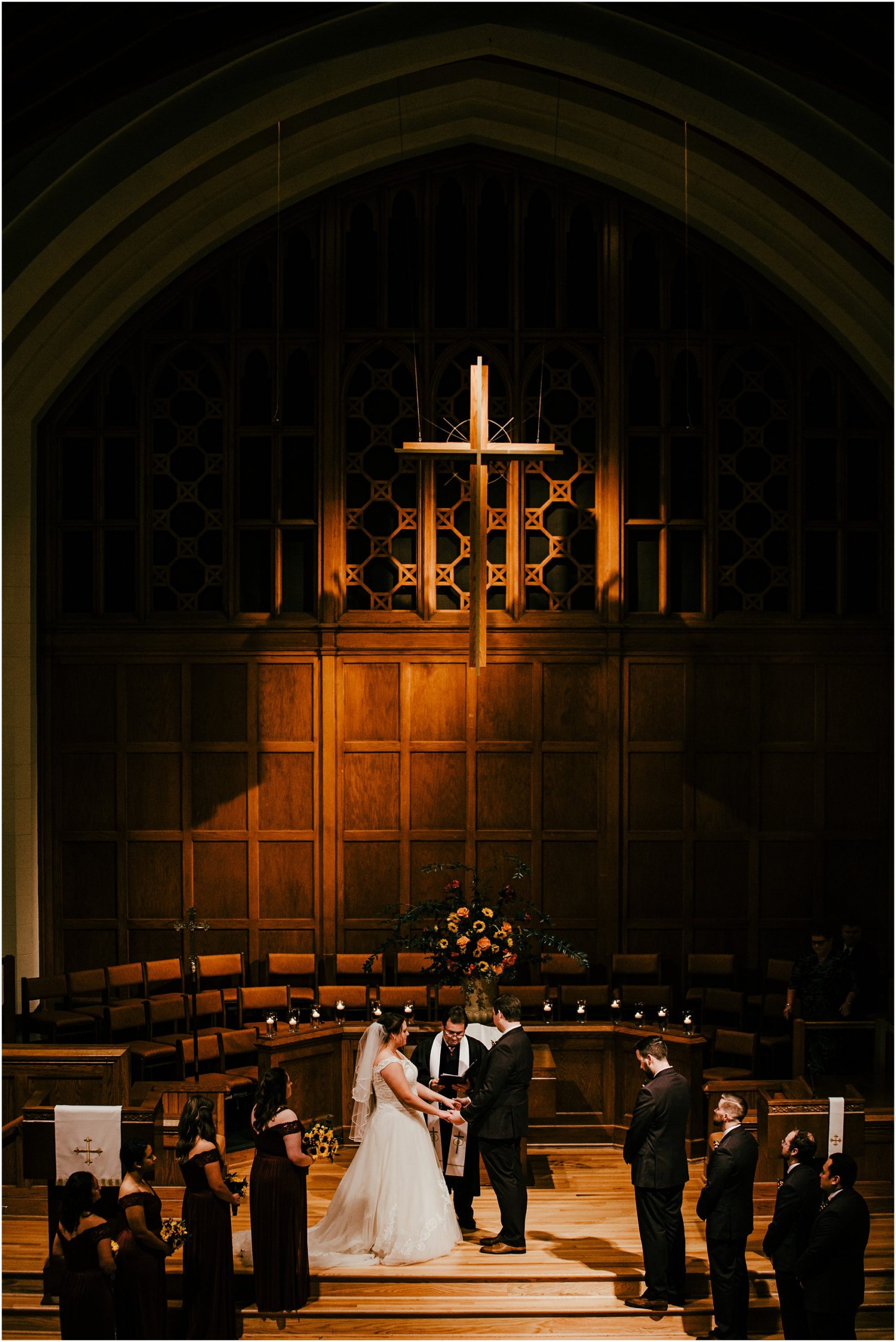 Bride and groom on stage during their evening Memphis ceremony