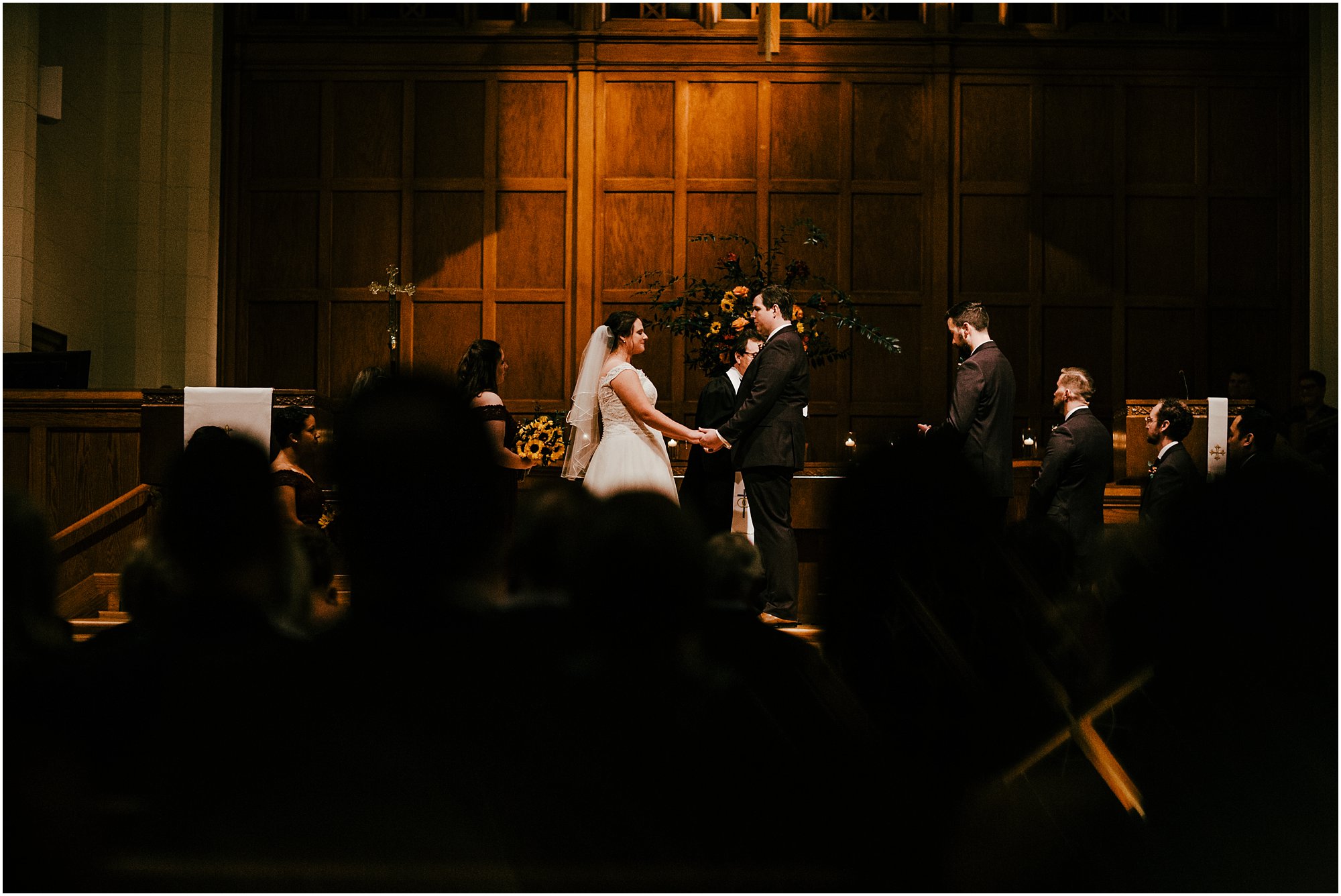 Bride and groom on stage during their evening Memphis ceremony
