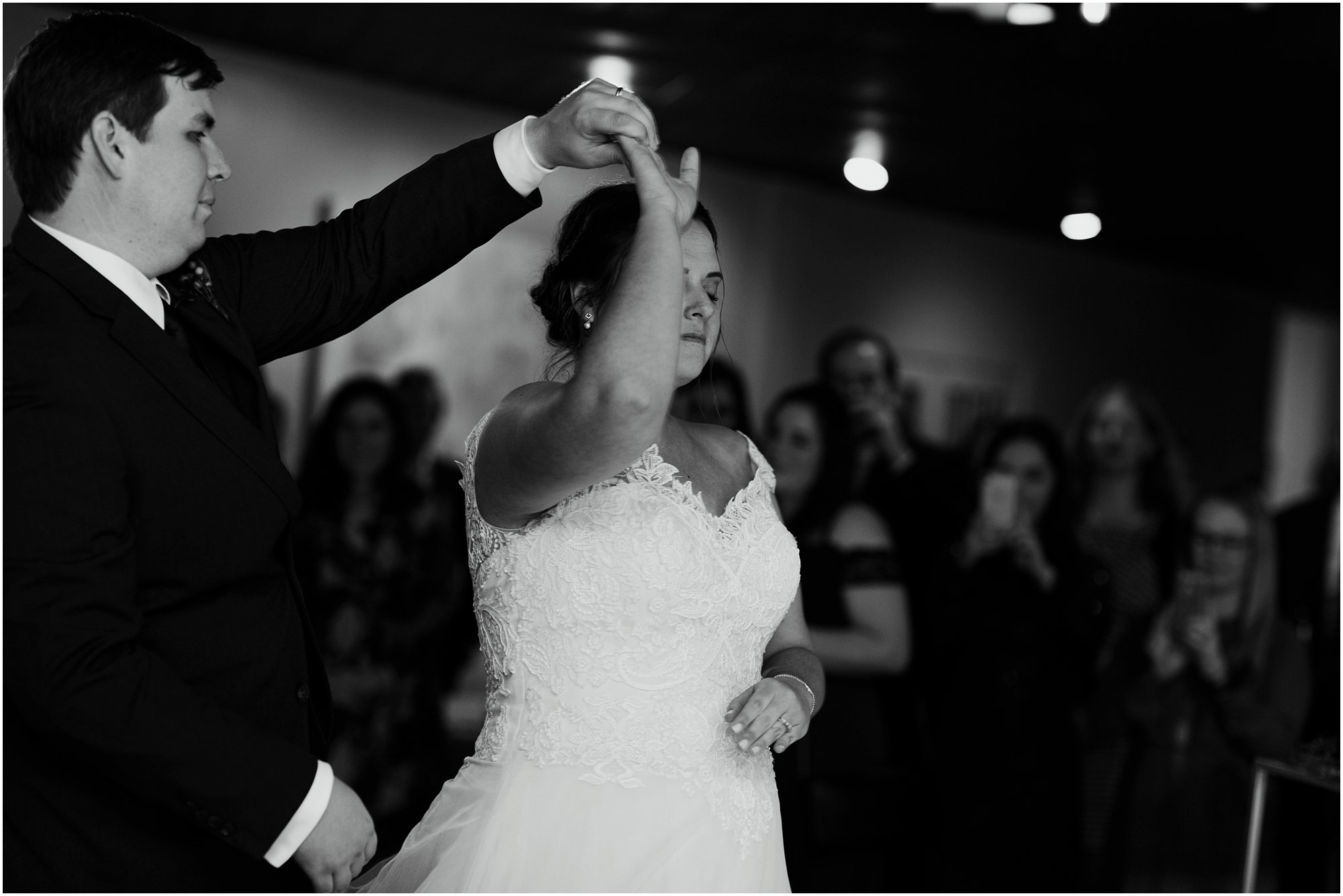 Groom spinning his bride around during their Memphis, TN reception